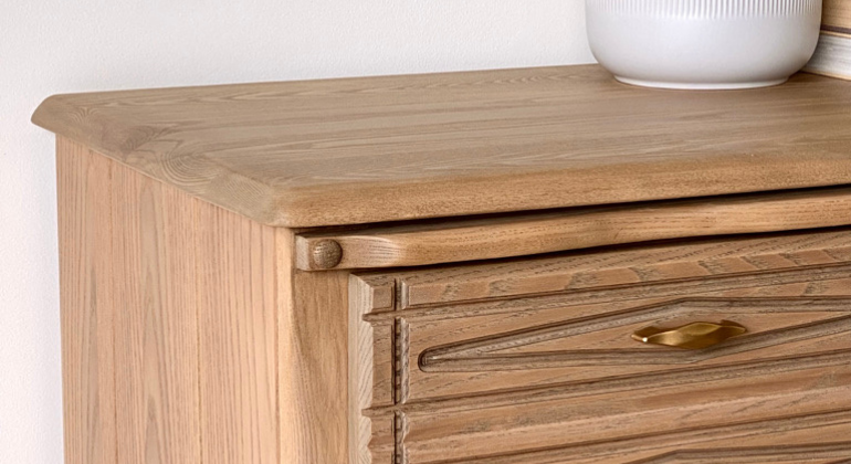close-up showing the woodgrain and beauty of a naturally enhanced oak dreser