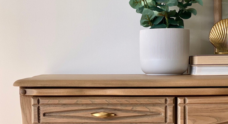 A close-up of decor on the finished dresser.
