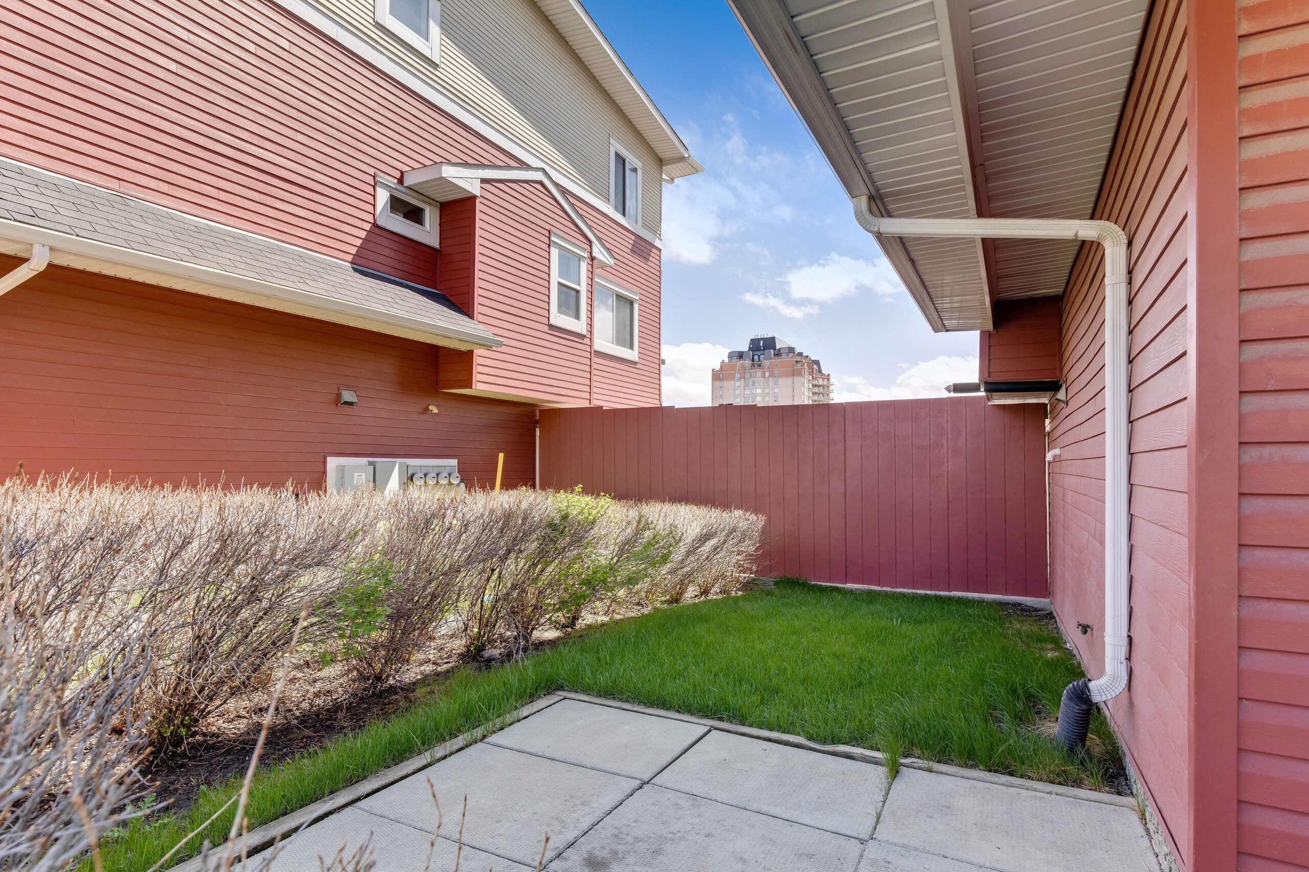 Green space next to a Habitat home in Calgary.