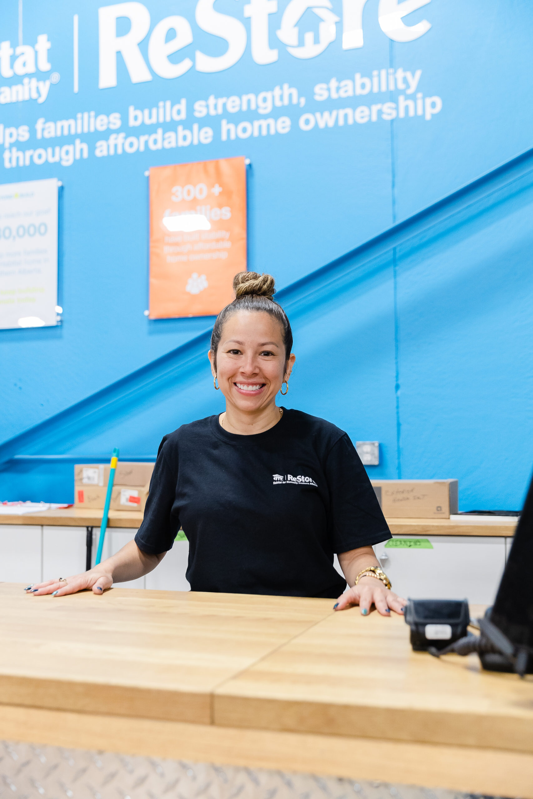 Habitat ReStore Staff smiling at register