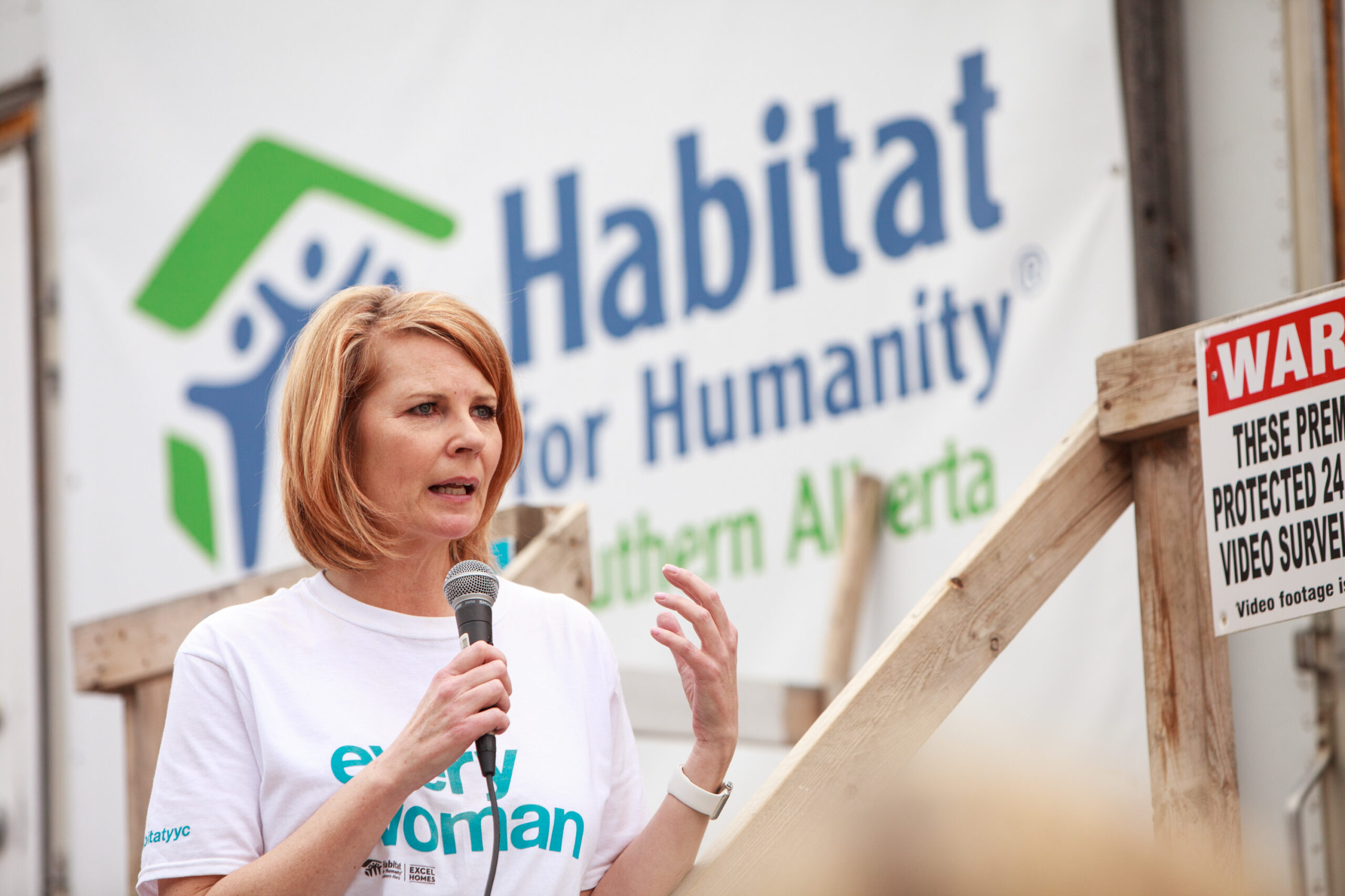 CTV News anchor Tara Nelson speaks to a crowd at Women Build in 2017.