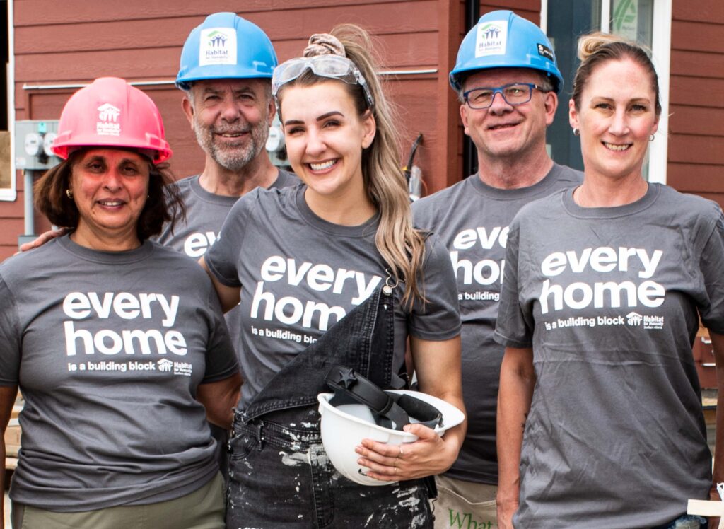 A group of volunteers on a Habitat build site