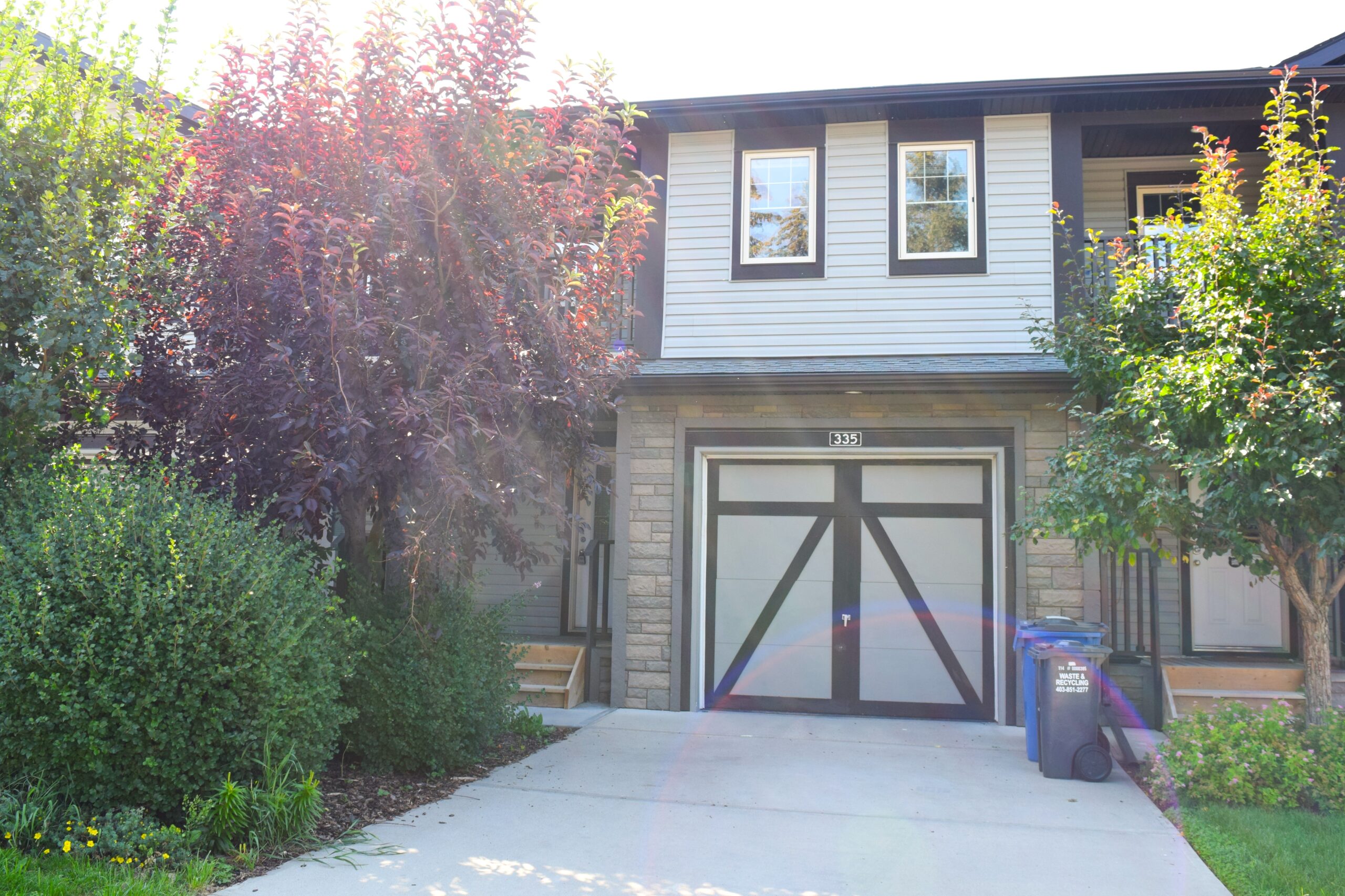 Single car attached garage and a parkpad