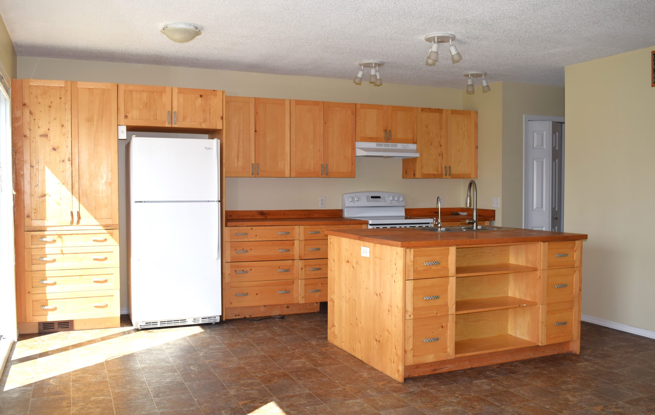 Open concept natural wood kitchen