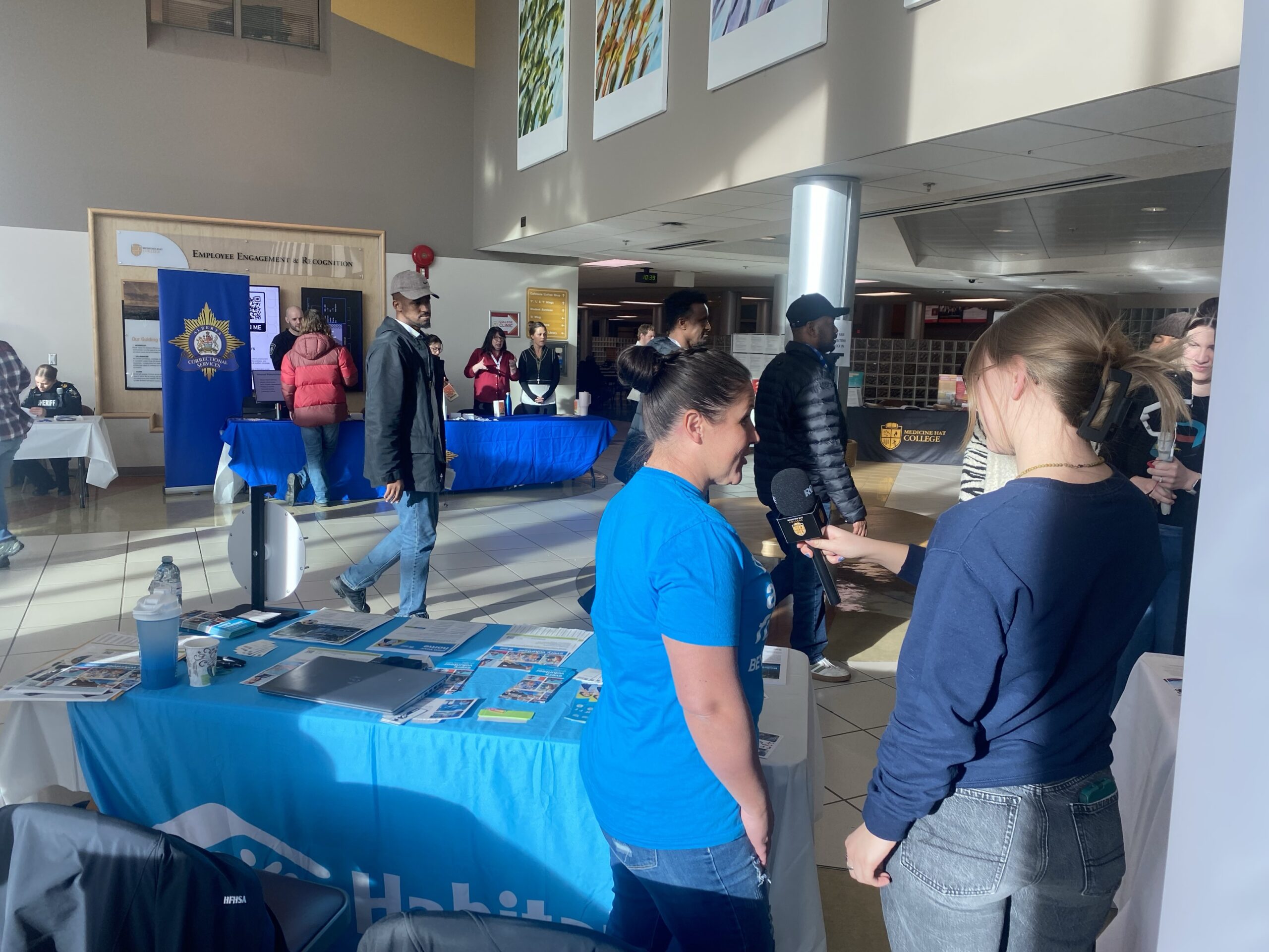 Annette being interviewed by Medicine Hat College for an article about Habitat.