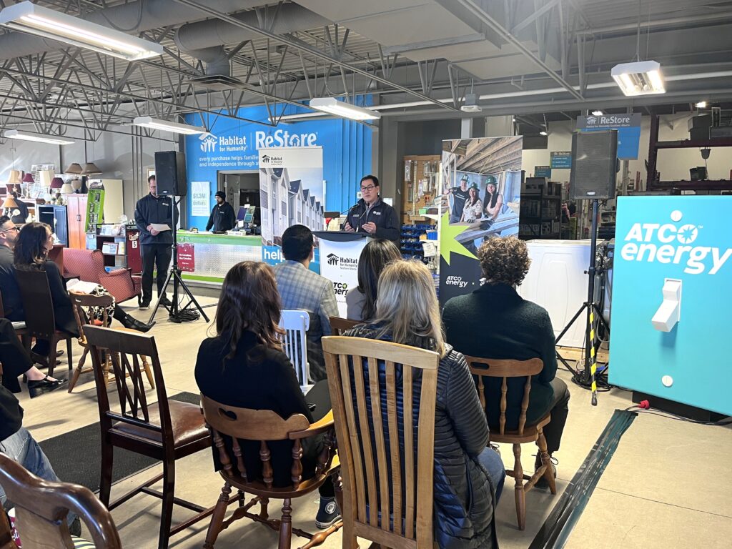 Habitat CEO Gerrad Oishi speaks to the media at Habitat ReStore about their partnership with ATCO energy.