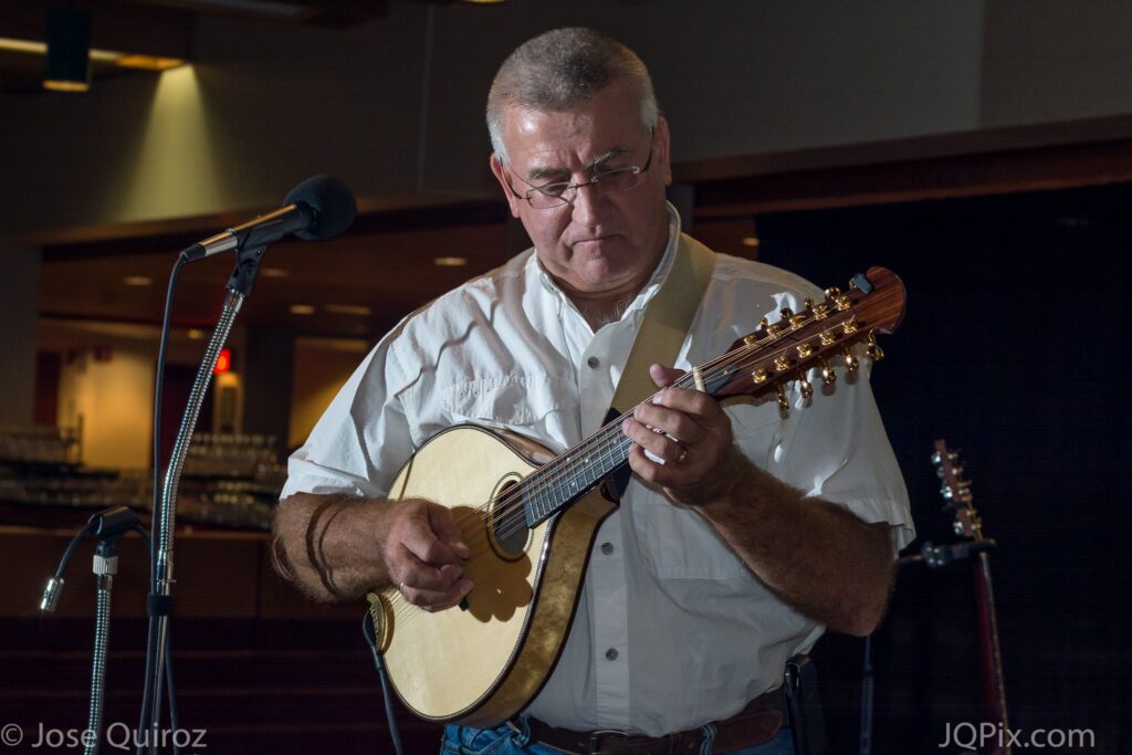 Volunteer Steve playing a banjo.