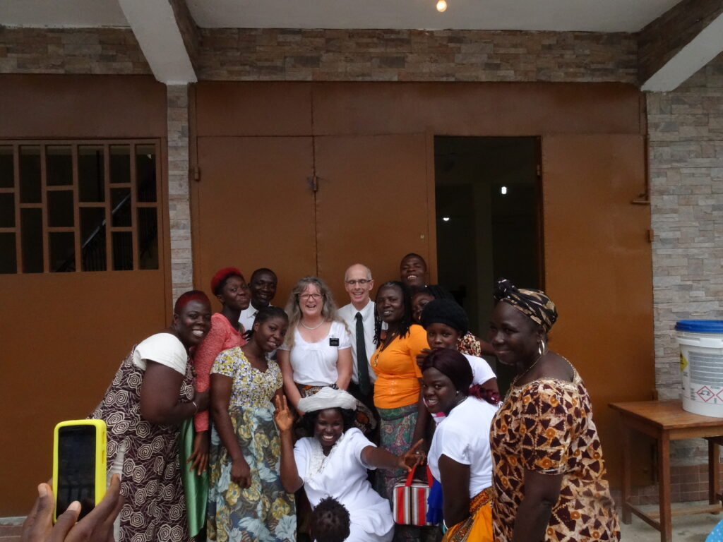 Rick and his wife take a group photo on their church mission in Liberia. 