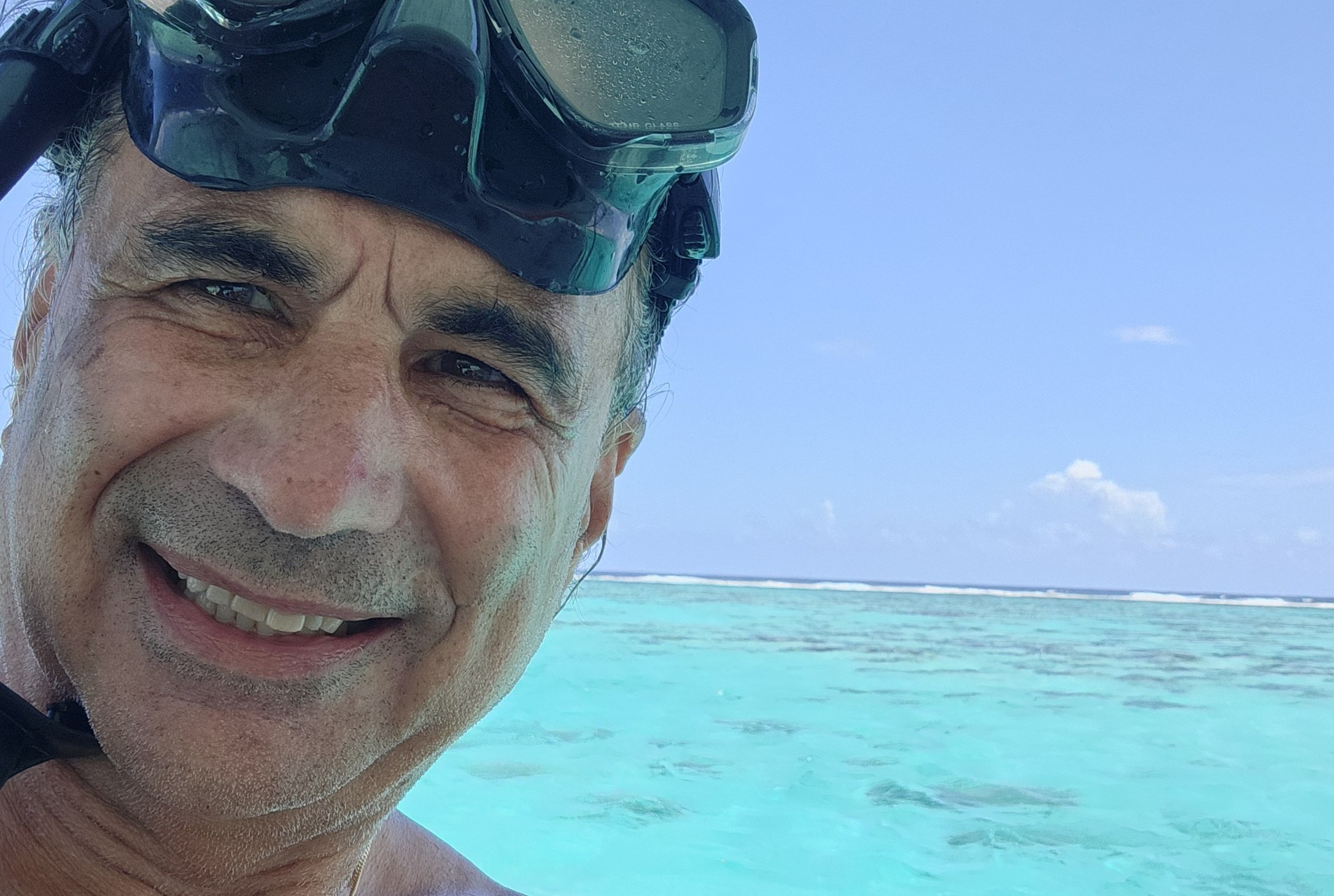 Marc takes a selfie with the ocean
