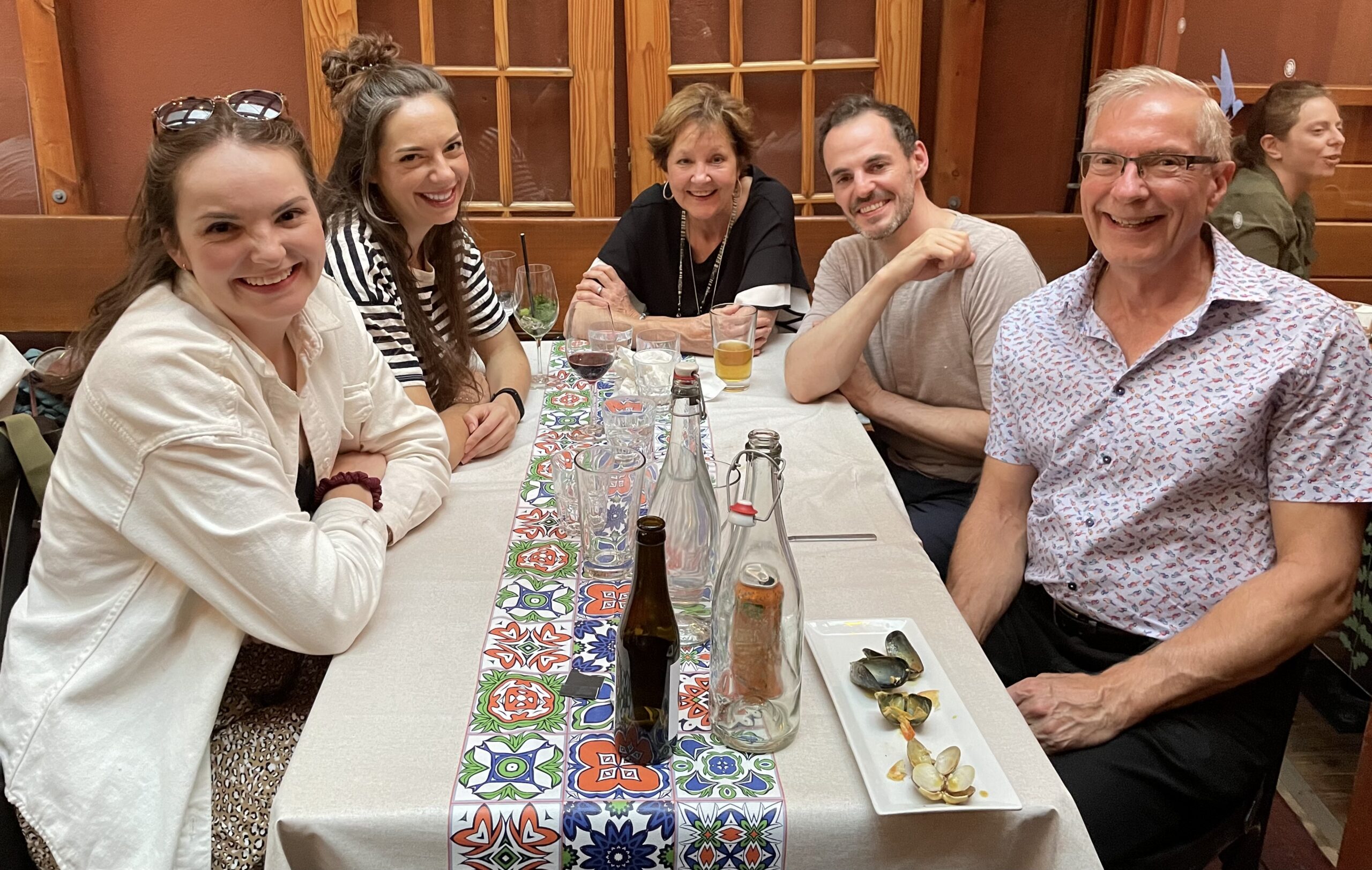 Cliff with family around a dinner table.