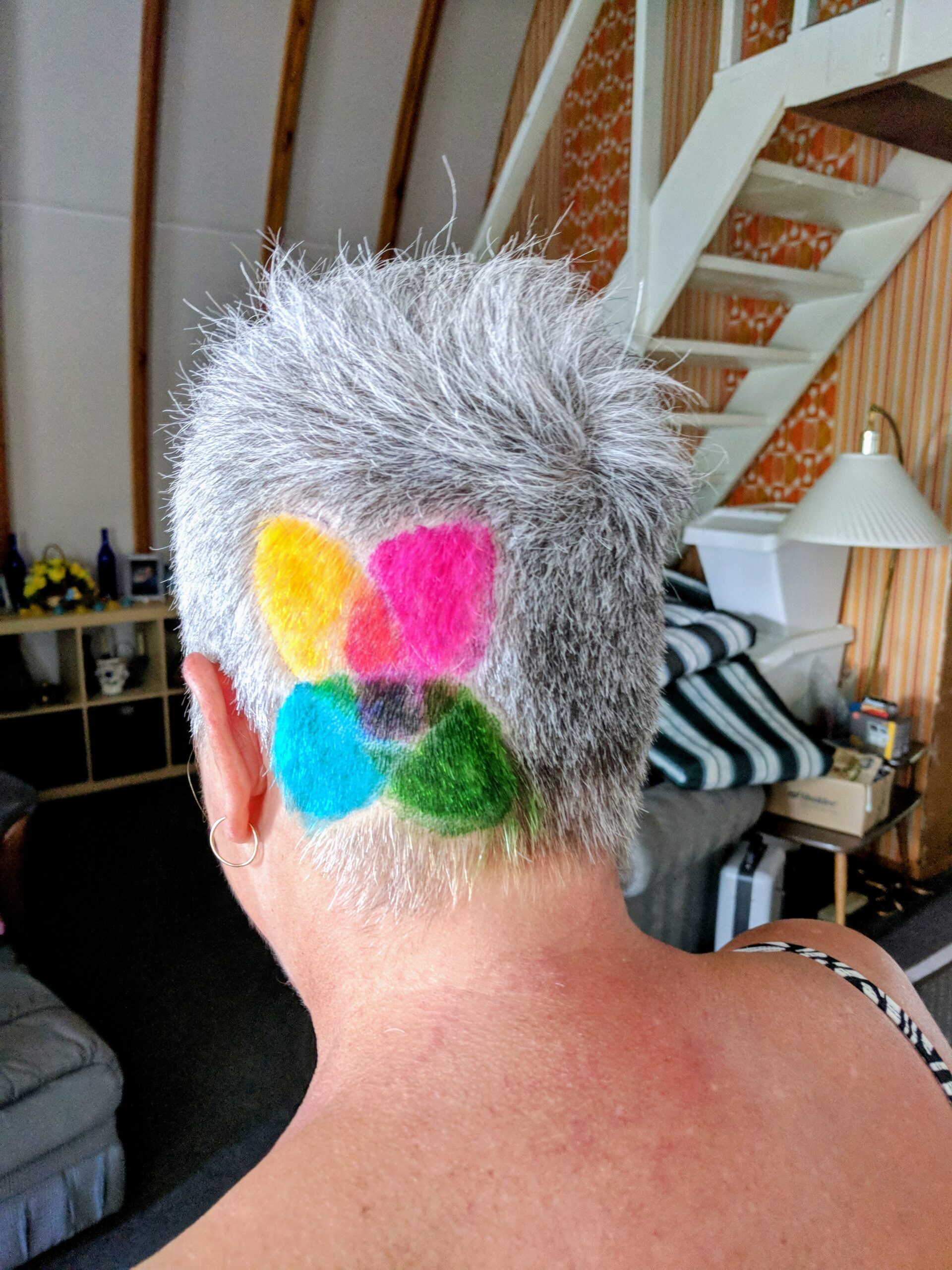 Hospice Calgary logo dyed into Marie's hair